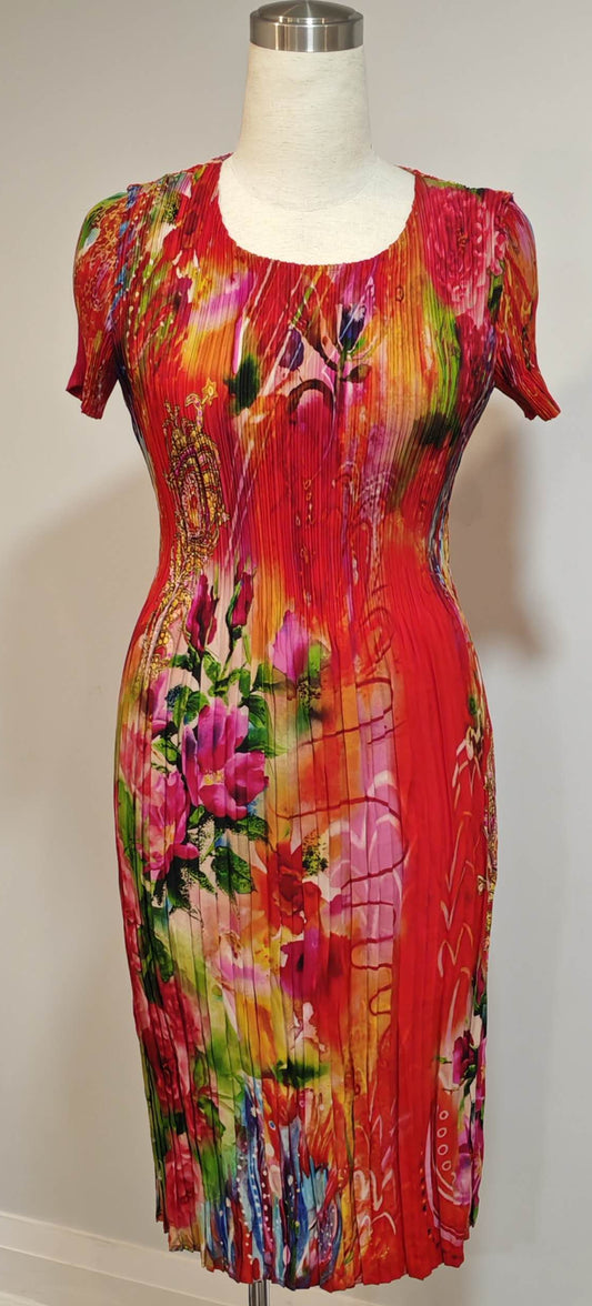Colorful floral dress on a mannequin against a white background