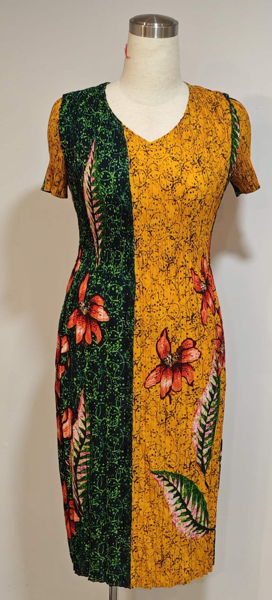 Floral patterned dress on a mannequin against a white background